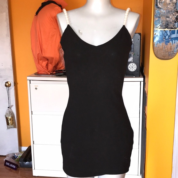 black dress with pearl straps